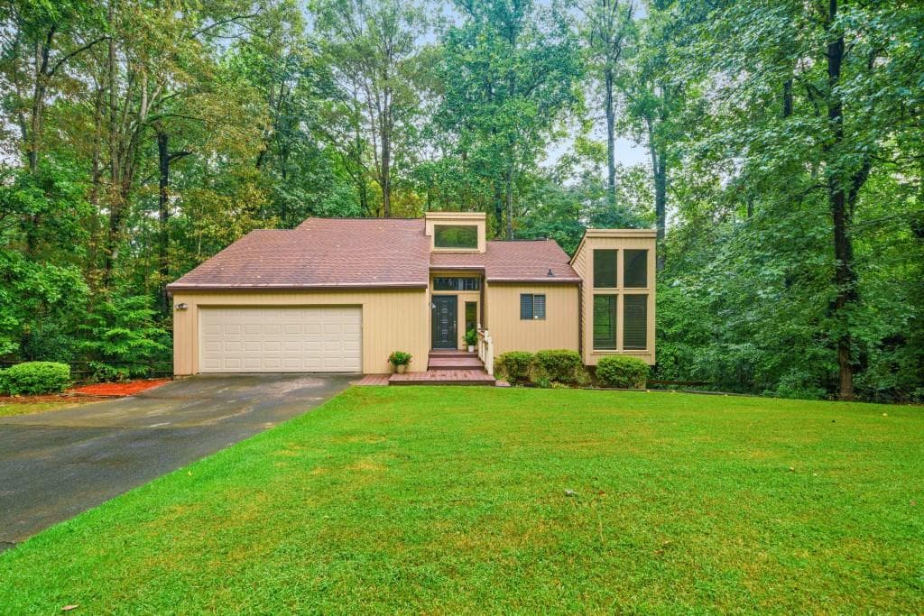 3 bedroom, 2 bathroom, 2,051 sq ft single family residence sold at 3969 Rock Mill Drive, Marietta, GA 30062
