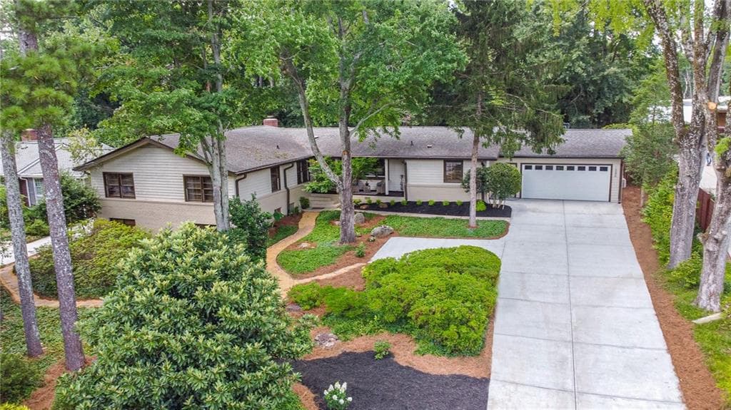 5 bedroom, 4 bathroom, 4,200 sq ft single family residence sold at 1586 Rainier Falls Drive, Atlanta, GA 30329