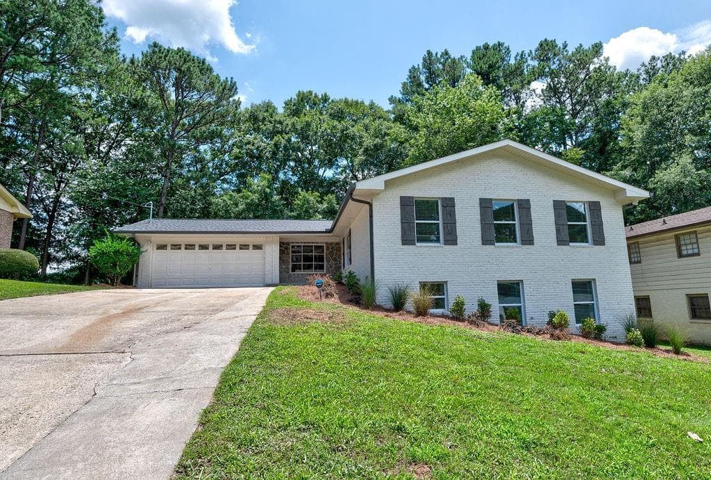 4 bedroom, 3 bathroom, 3,134 sq ft single family residence sold at 1701 W Caribaea Trail, Atlanta, GA 30316