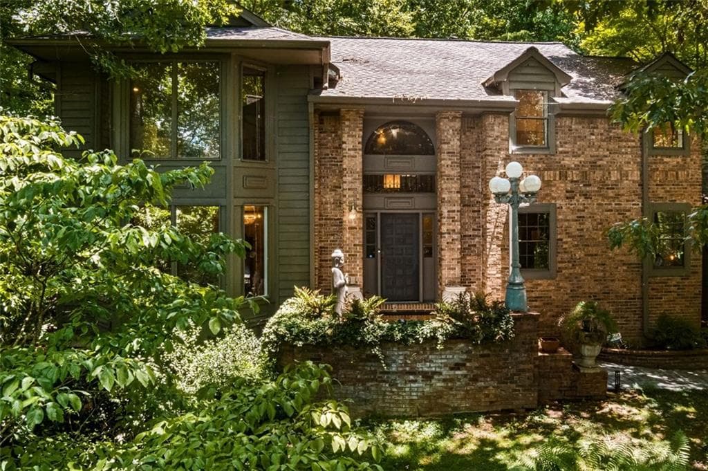 6 bedroom, 4 bathroom, 5,734 sq ft single family residence sold at 9360 HUNTCLIFF Trace, Sandy Springs, GA 30350