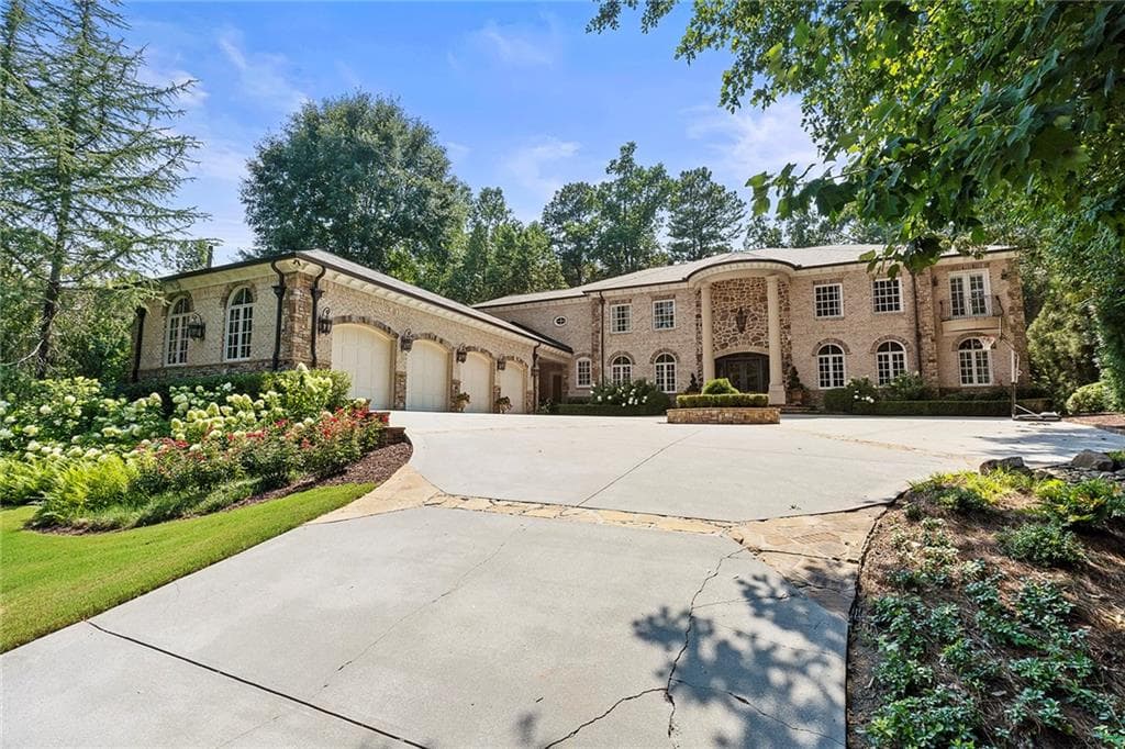 7 bedroom, 11 bathroom, 10,290 sq ft single family residence sold at 5170 Peachtree Dunwoody Road, Sandy Springs, GA 30342