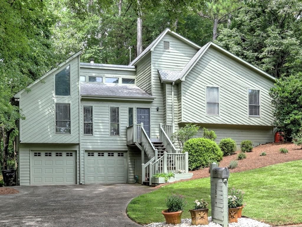 4 bedroom, 3 bathroom, 2,400 sq ft single family residence sold at 1877 Falcon Wood Drive, Marietta, GA 30066