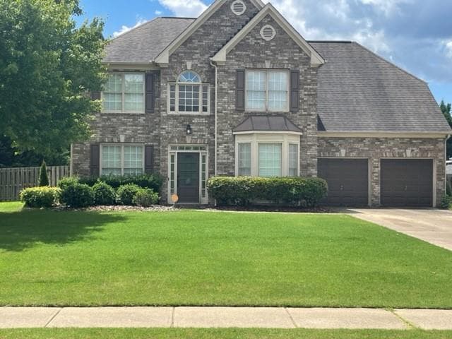 4 bedroom, 3 bathroom, 2,498 sq ft single family residence sold at 307 Brookcliff Drive, Sugar Hill, GA 30518