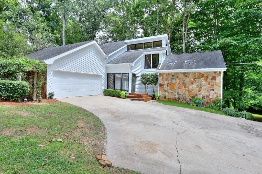 5 bedroom, 4 bathroom single family residence sold at 5067 Oak Grove Drive, Sugar Hill, GA 30518