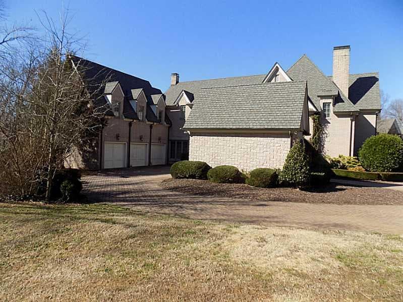 7 bedroom, 9,783 sq ft single family residence sold at 216 Londonberry Road, Atlanta, GA 30327
