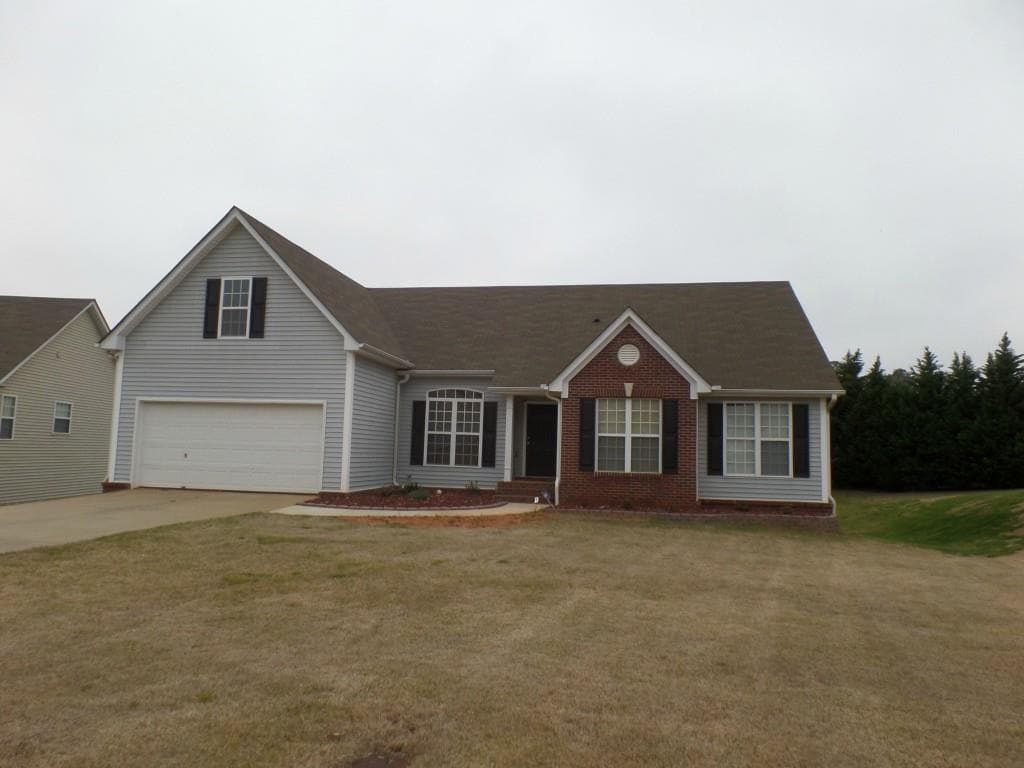 4 bedroom single family residence sold at 605 Windsor Brook Lane, Lawrenceville, GA 30045