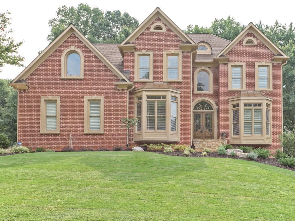 5 bedroom single family residence sold at 910 Riverhaven Drive, Suwanee, GA 30024
