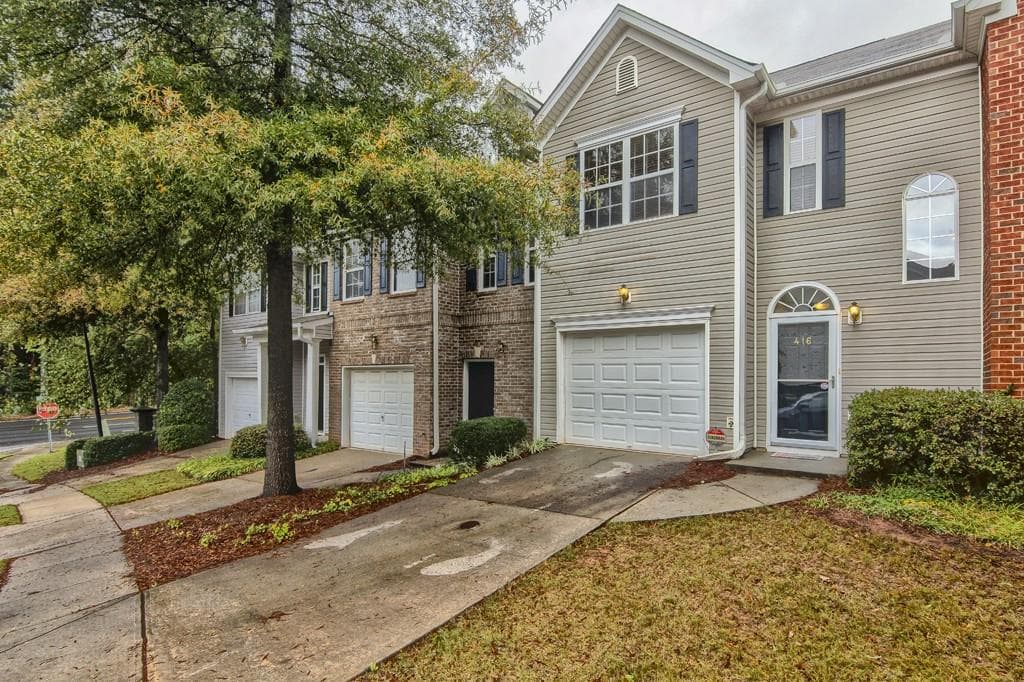 3 bedroom, 1,596 sq ft townhouse sold at 416 Lantern Wood Drive -, Scottdale, GA 30079