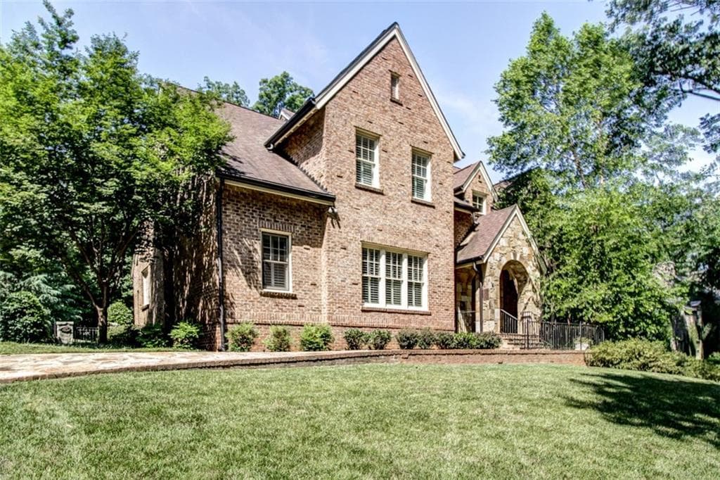 6 bedroom, 6,728 sq ft single family residence sold at 2071 E Lake Road, Atlanta, GA 30307