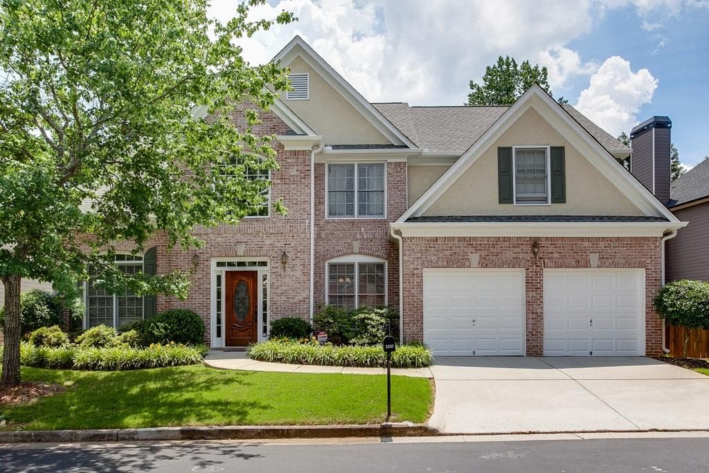 4 bedroom single family residence sold at 2537 E Madison Drive, Doraville, GA 30360