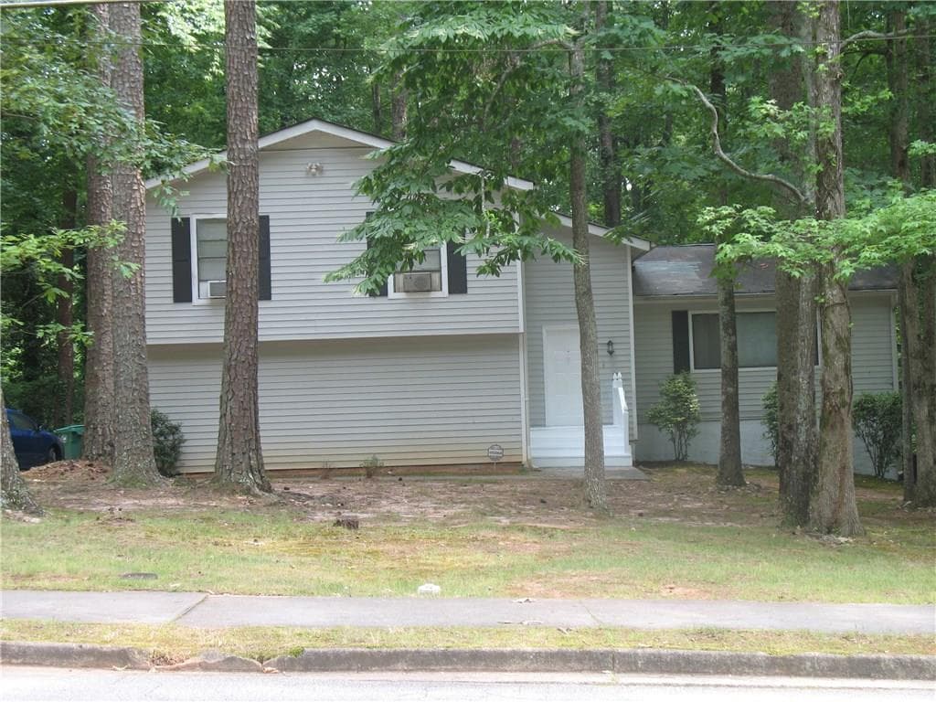 4 bedroom, 2,060 sq ft single family residence sold at 5215 Mainstreet Park Drive, Stone Mountain, GA 30088