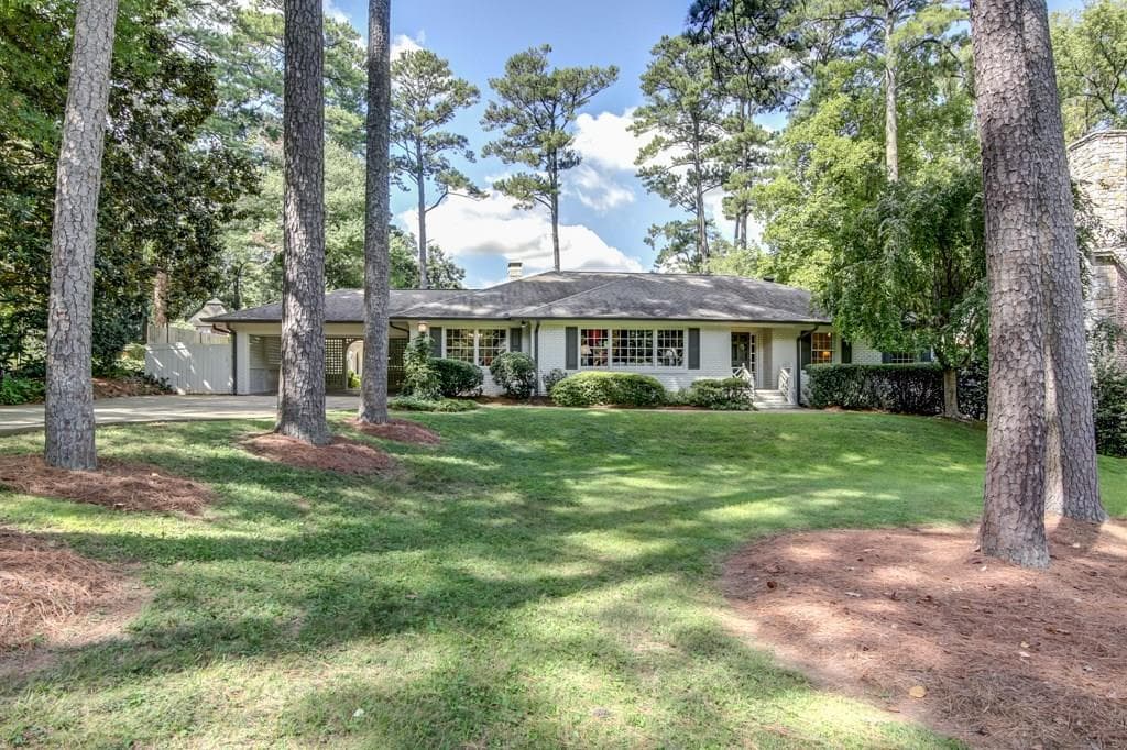 4 bedroom, 4,362 sq ft single family residence sold at 3128 E Wood Valley Road, Atlanta, GA 30327