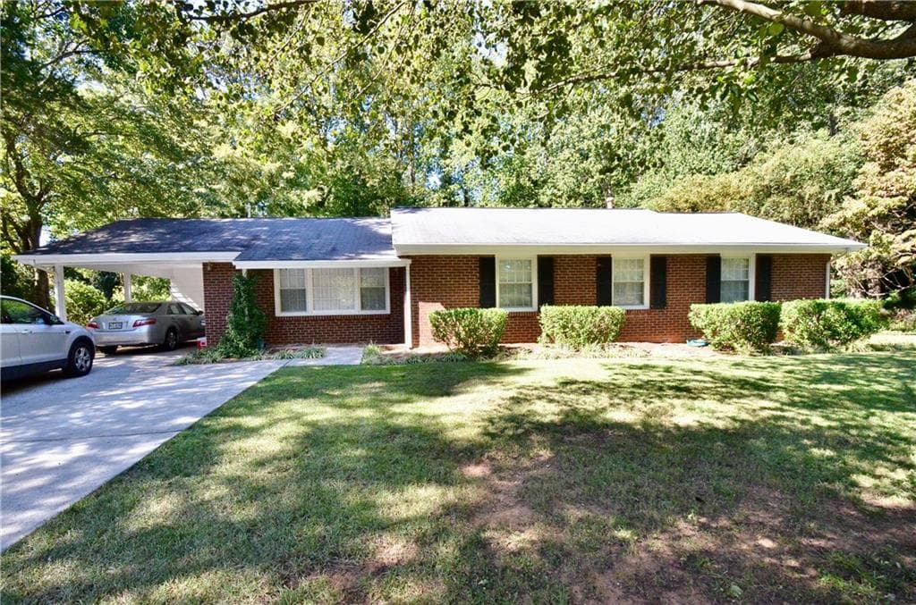 4 bedroom, 1,864 sq ft single family residence sold at 6830 Sunny Brook Lane, Sandy Springs, GA 30328