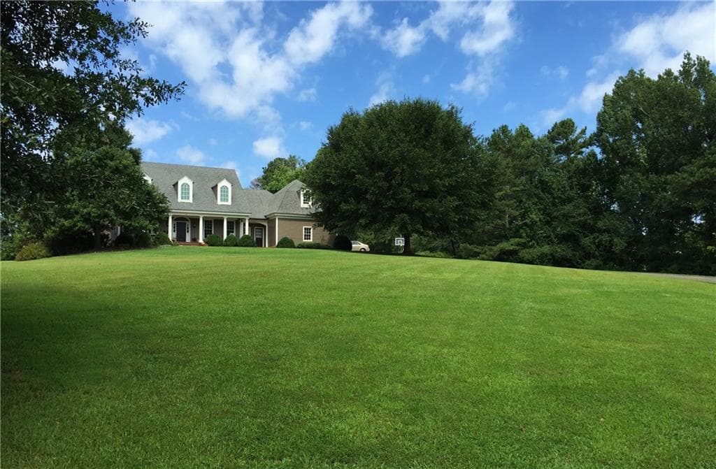 5 bedroom, 5,600 sq ft single family residence sold at 3740 Ryans Bluff Drive, Cumming, GA 30040