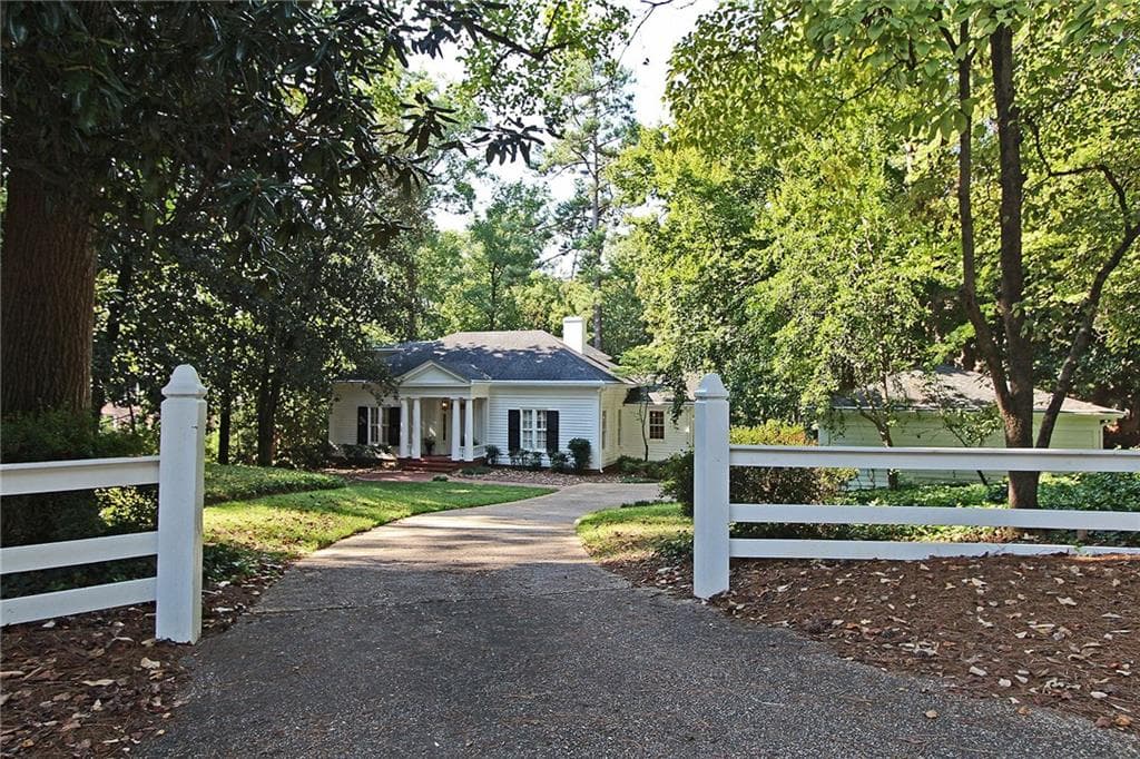 4 bedroom, 3,972 sq ft single family residence sold at 1450 W Wesley Road, Atlanta, GA 30327