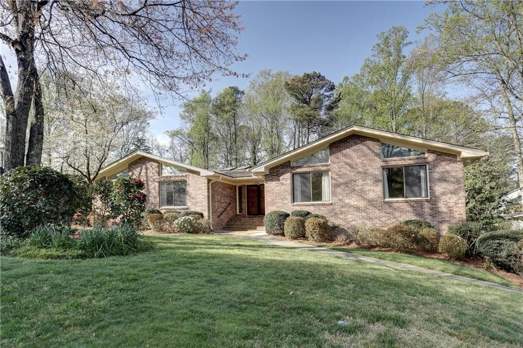 4 bedroom, 3,244 sq ft single family residence sold at 5402 Forest Springs Drive, Dunwoody, GA 30338