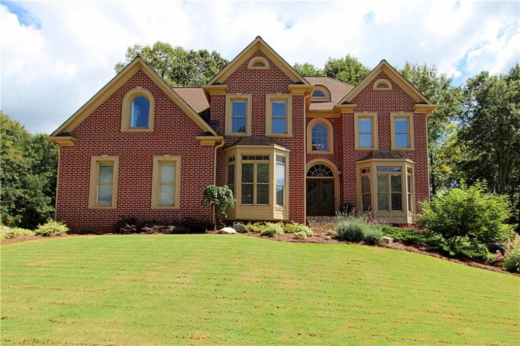 5 bedroom single family residence sold at 910 Riverhaven Drive, Suwanee, GA 30024
