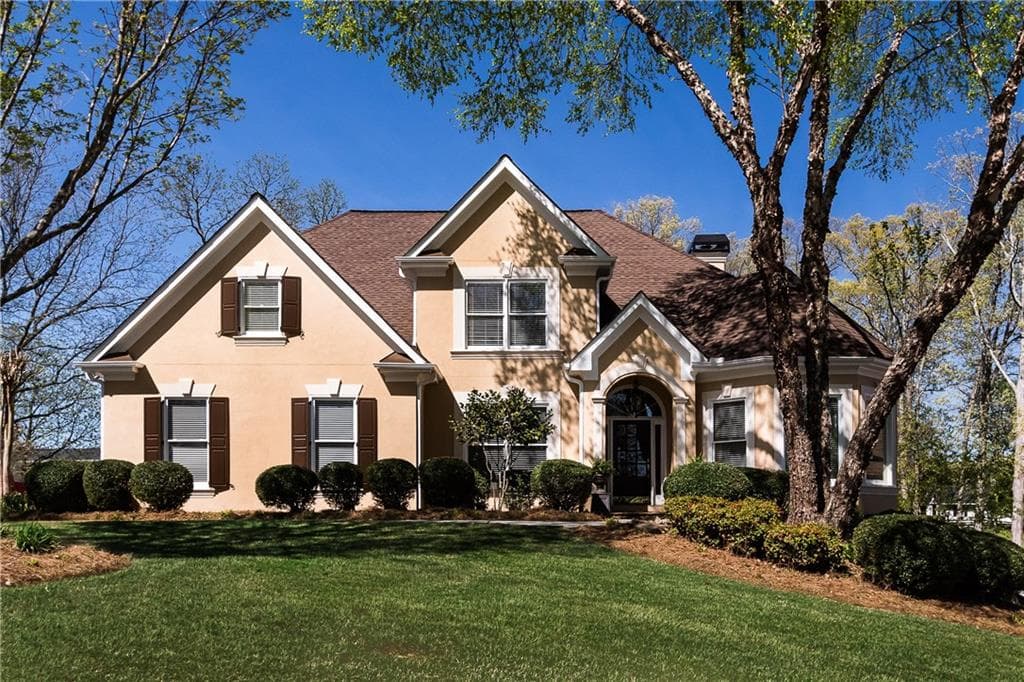 6 bedroom single family residence sold at 2410 Stonegate Drive, Cumming, GA 30041