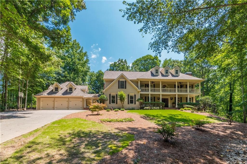 6 bedroom, 6,081 sq ft single family residence sold at 5030 Woodlong Lane, Cumming, GA 30040 — photo 1 of 1