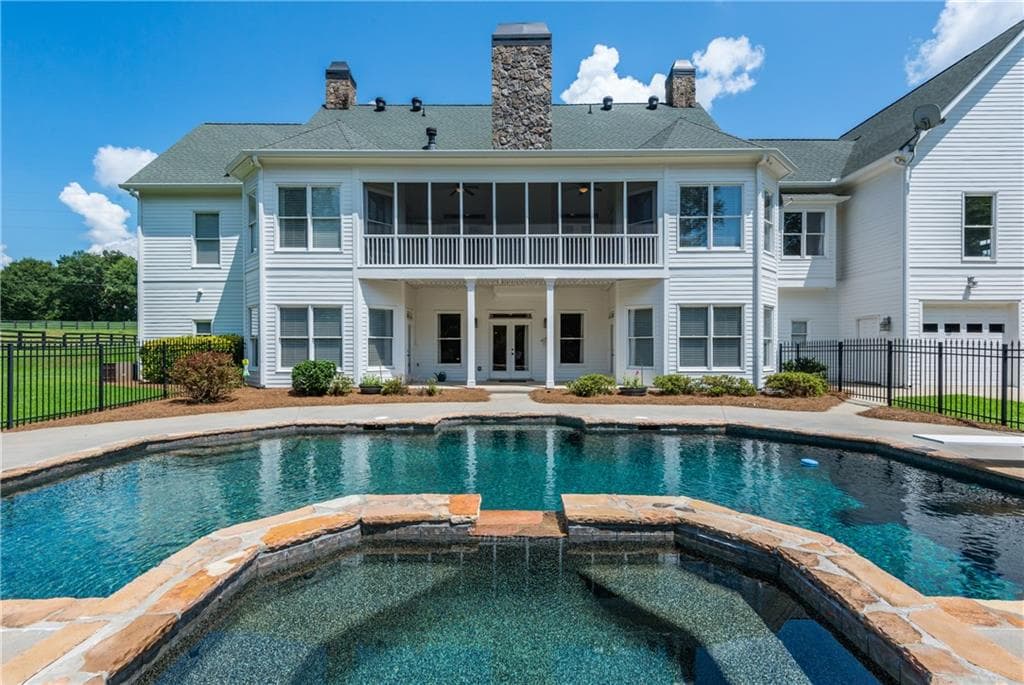5 bedroom, 6,448 sq ft single family residence sold at 6755 Mockingbird Road, Cumming, GA 30028