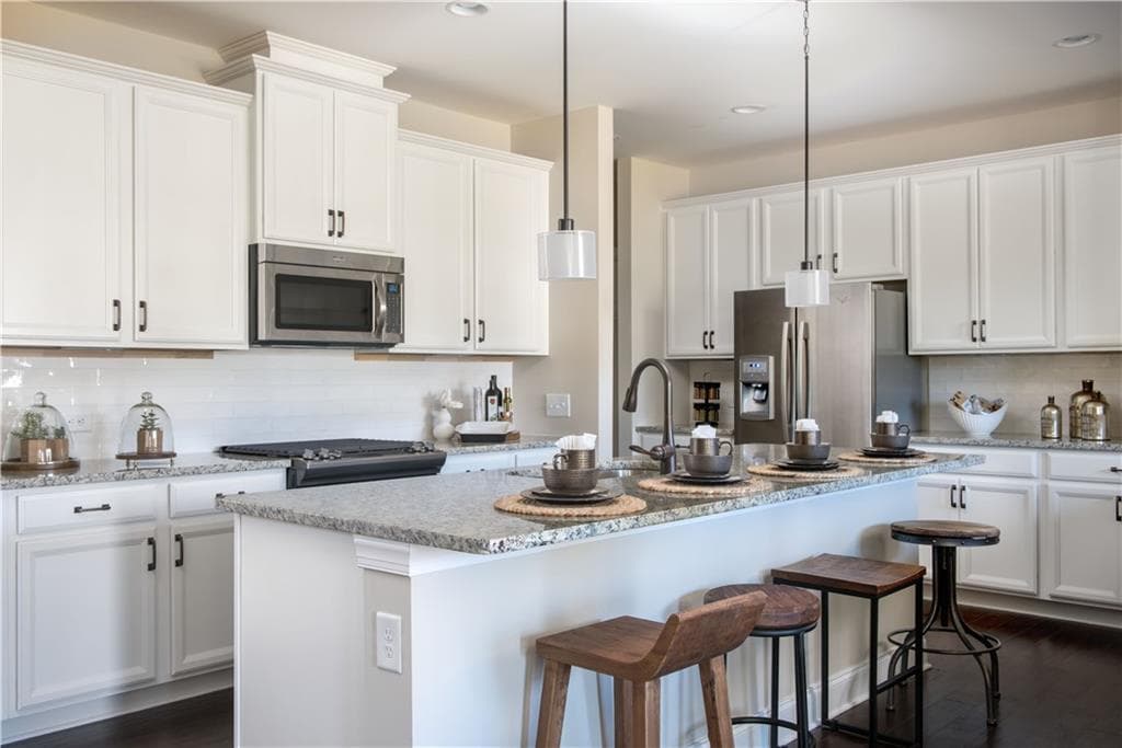 3 bedroom, 2,164 sq ft townhouse sold at 8640 Village Place Lane 29, Suwanee, GA 30024