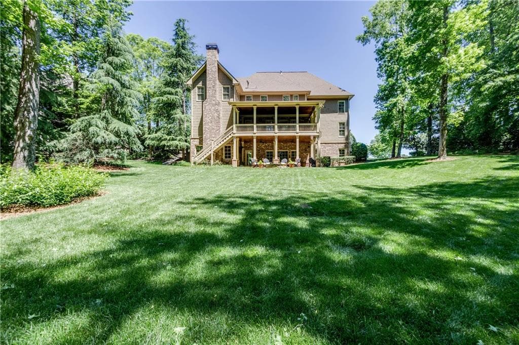 6 bedroom, 8,083 sq ft single family residence sold at 2160 Wood Falls Drive, Cumming, GA 30041