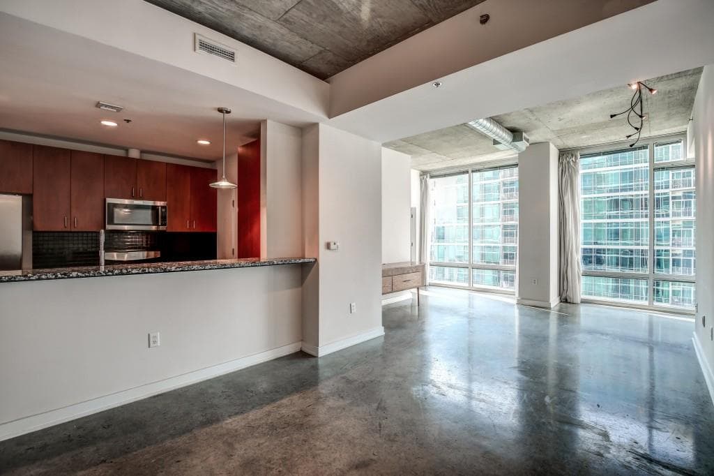 2 bedroom, 1,260 sq ft condominium sold at 943 Peachtree Street 1506, Atlanta, GA 30309