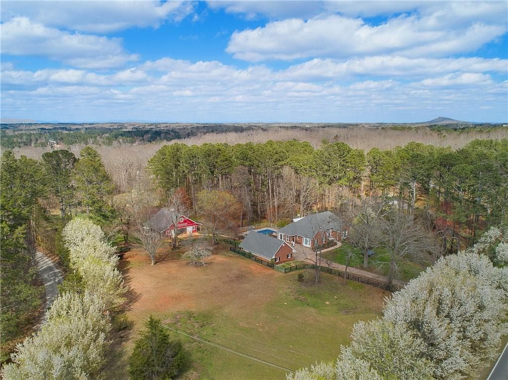 5 bedroom, 5,267 sq ft single family residence sold at 15350 Thompson Road, Milton, GA 30004