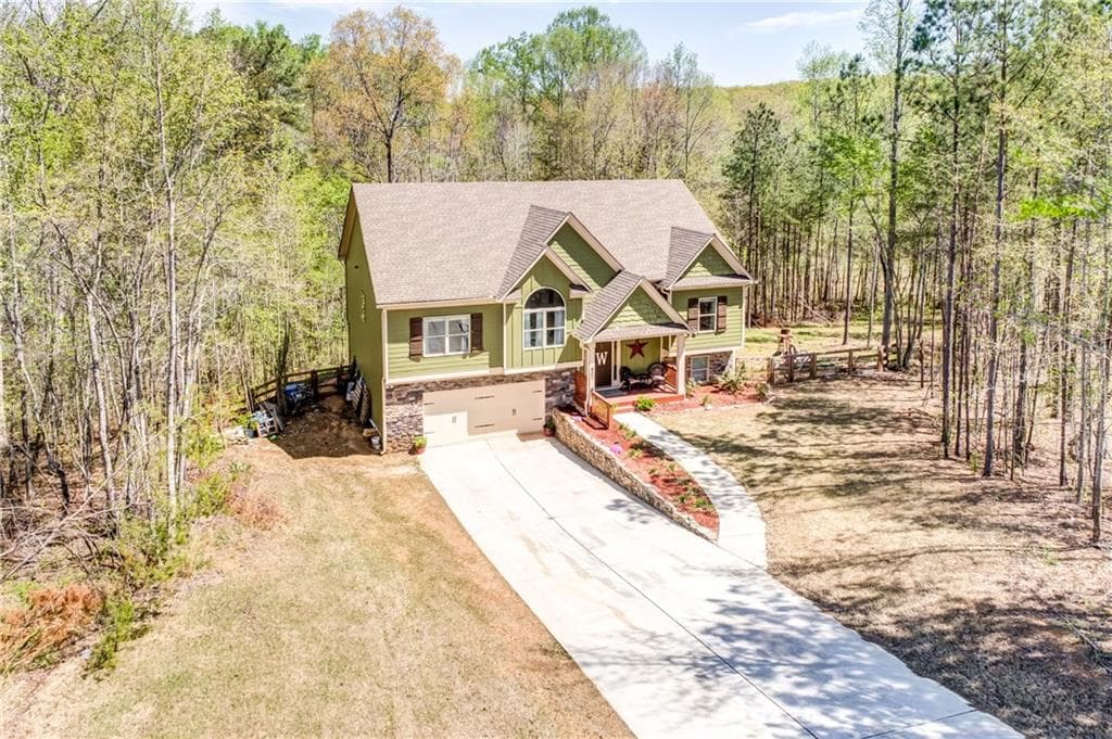 5 bedroom, 2,145 sq ft single family residence sold at 407 Wood Trace, Ball Ground, GA 30107