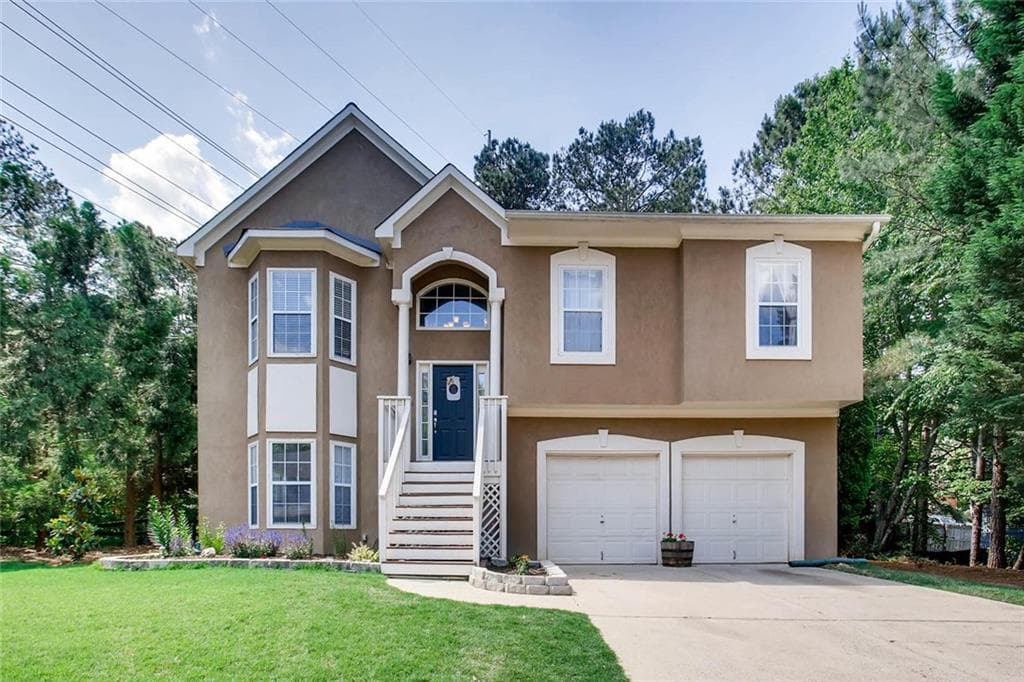 4 bedroom, 1,988 sq ft single family residence sold at 7044 Surrey Drive, Woodstock, GA 30189