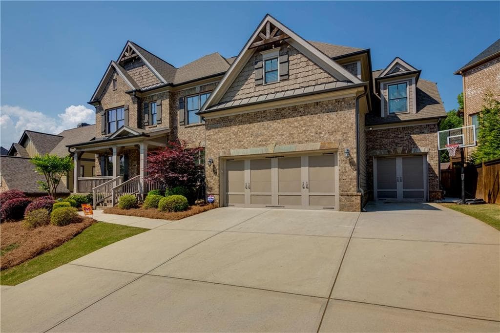 5 bedroom, 3,818 sq ft single family residence sold at 1245 Whisper Cove Drive, Buford, GA 30518