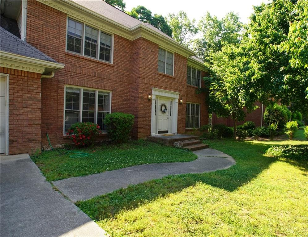 4 bedroom single family residence sold at 5100 Huntshire Lane SW, Lilburn, GA 30047