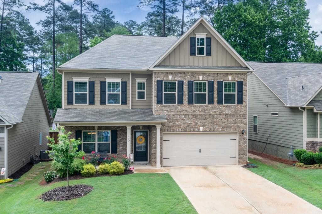 4 bedroom, 3,112 sq ft single family residence sold at 127 Stone Manor Court, Woodstock, GA 30188