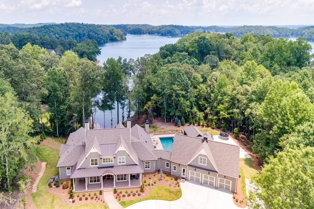 7 bedroom, 8,400 sq ft single family residence sold at 7305 Breeze Bay Road, Cumming, GA 30041