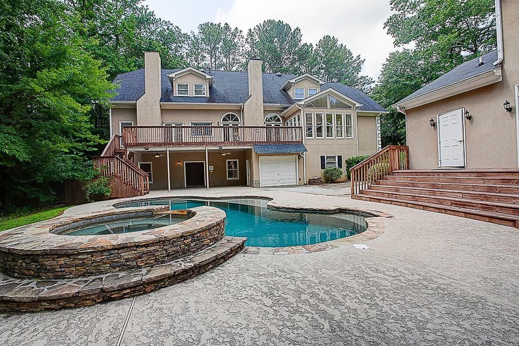 7 bedroom, 5,644 sq ft single family residence sold at 2010 Stonehedge Road, Roswell, GA 30075