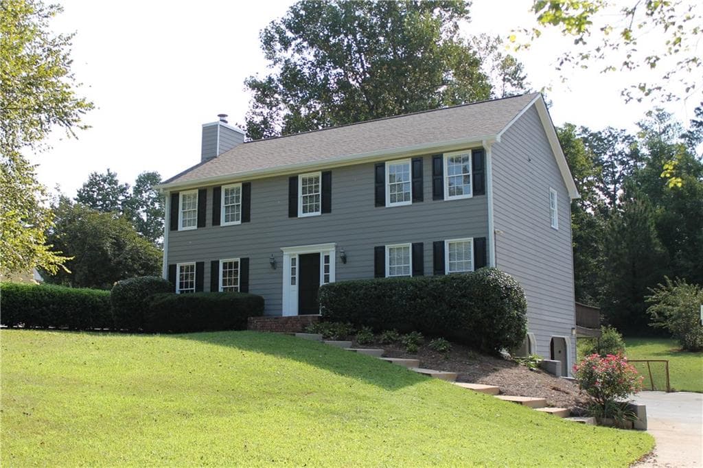 4 bedroom single family residence sold at 1863 Windcrest Drive, Lilburn, GA 30047