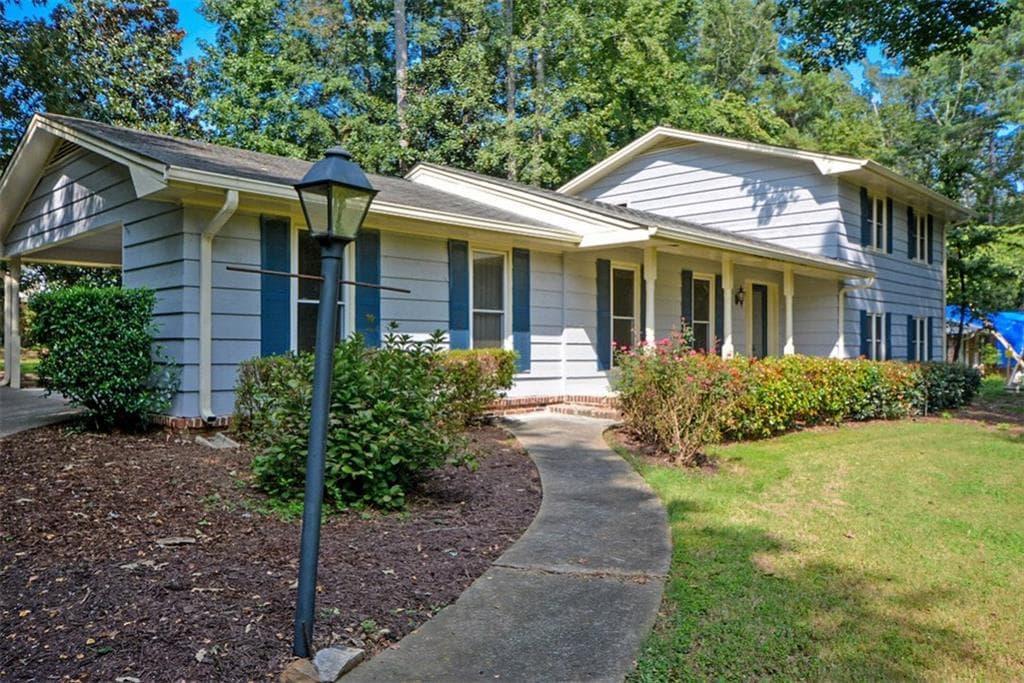4 bedroom, 2,236 sq ft single family residence sold at 441 Village Green Court, Lilburn, GA 30047