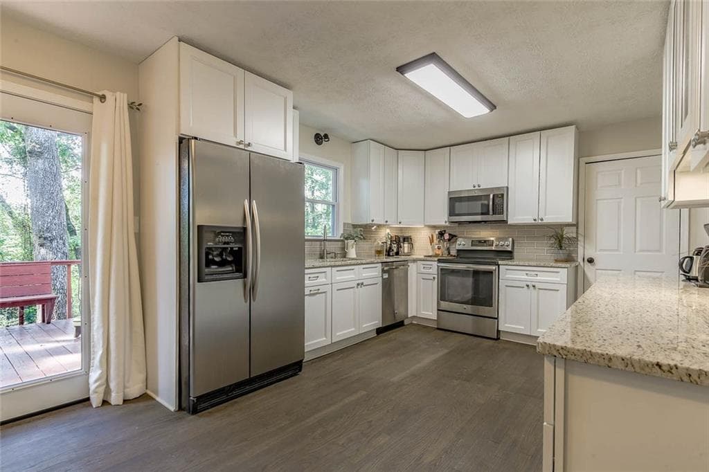 4 bedroom, 1,902 sq ft single family residence sold at 1590 Woodcreek Drive, Cumming, GA 30041