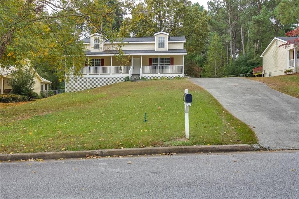 4 bedroom, 1,936 sq ft single family residence sold at 2015 Red Rose Lane, Loganville, GA 30052