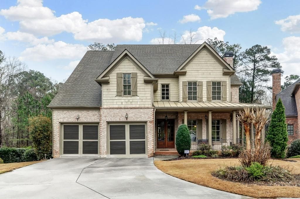 5 bedroom, 5,702 sq ft single family residence sold at 130 Lullwater Court, Roswell, GA 30075