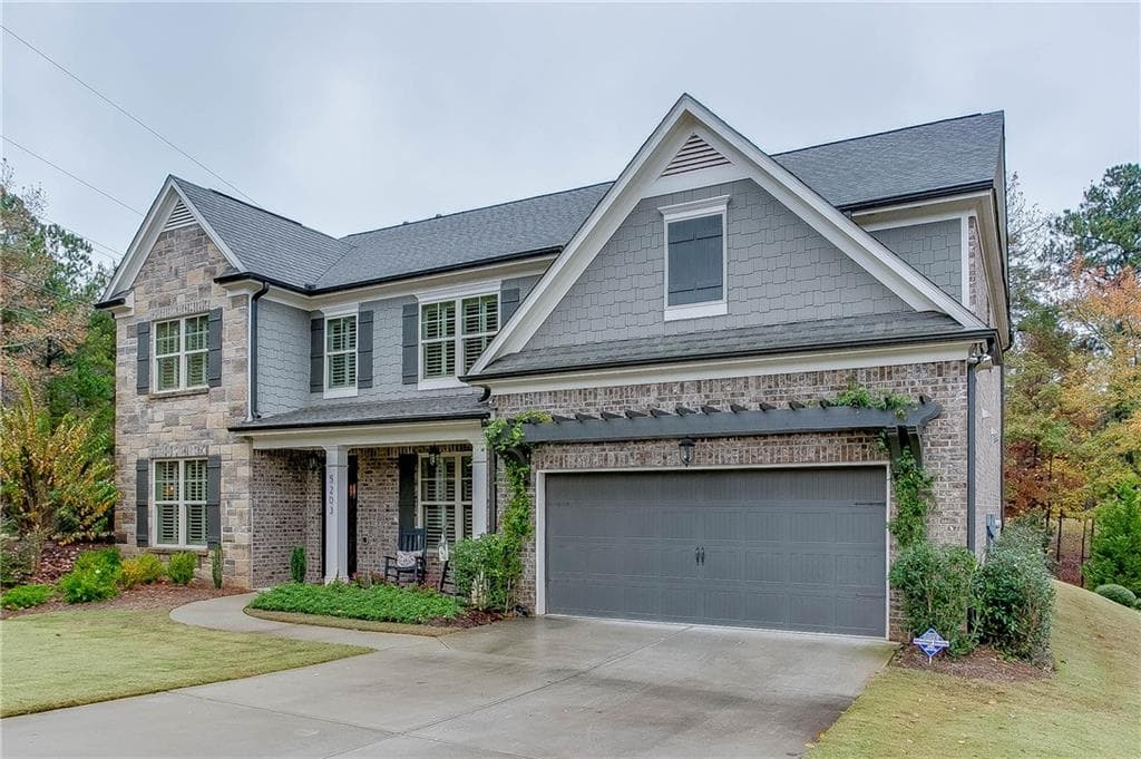 5 bedroom, 3,900 sq ft single family residence sold at 5203 Wild Cedar Drive, Buford, GA 30518