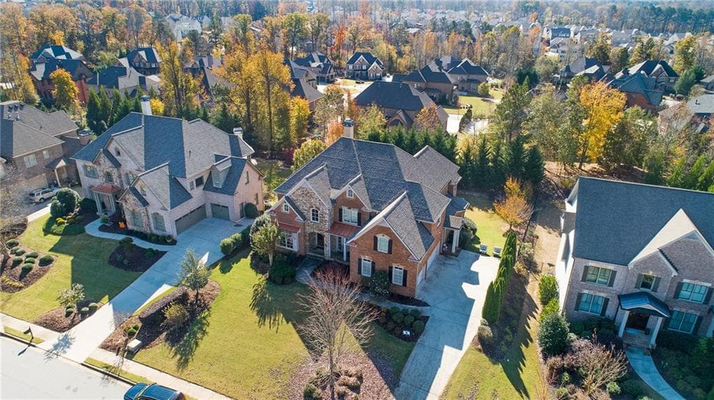 6 bedroom, 7,046 sq ft single family residence sold at 5415 Harris Springs Drive, Cumming, GA 30040