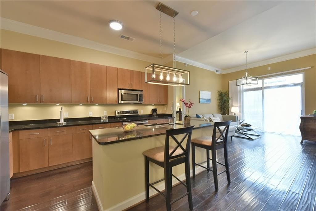 2 bedroom, 1,061 sq ft condominium sold at 711 Cosmopolitan Drive 122, Atlanta, GA 30324