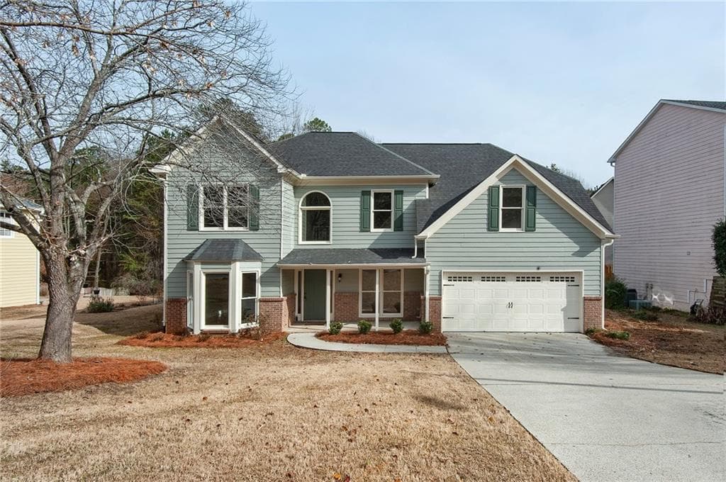 5 bedroom, 2,586 sq ft single family residence sold at 7124 Big Woods Drive, Woodstock, GA 30189