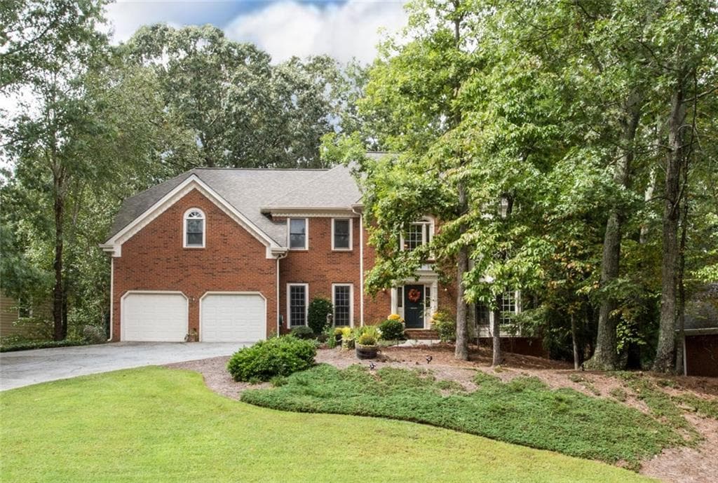 5 bedroom, 4,162 sq ft single family residence sold at 11860 Wildwood Springs Drive, Roswell, GA 30075