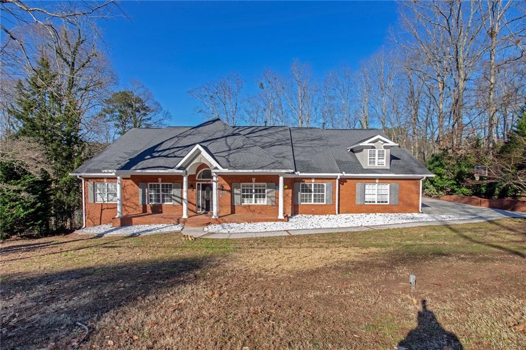 6 bedroom, 10,000 sq ft single family residence sold at 1465 Loch Lomond Trail, Atlanta, GA 30331