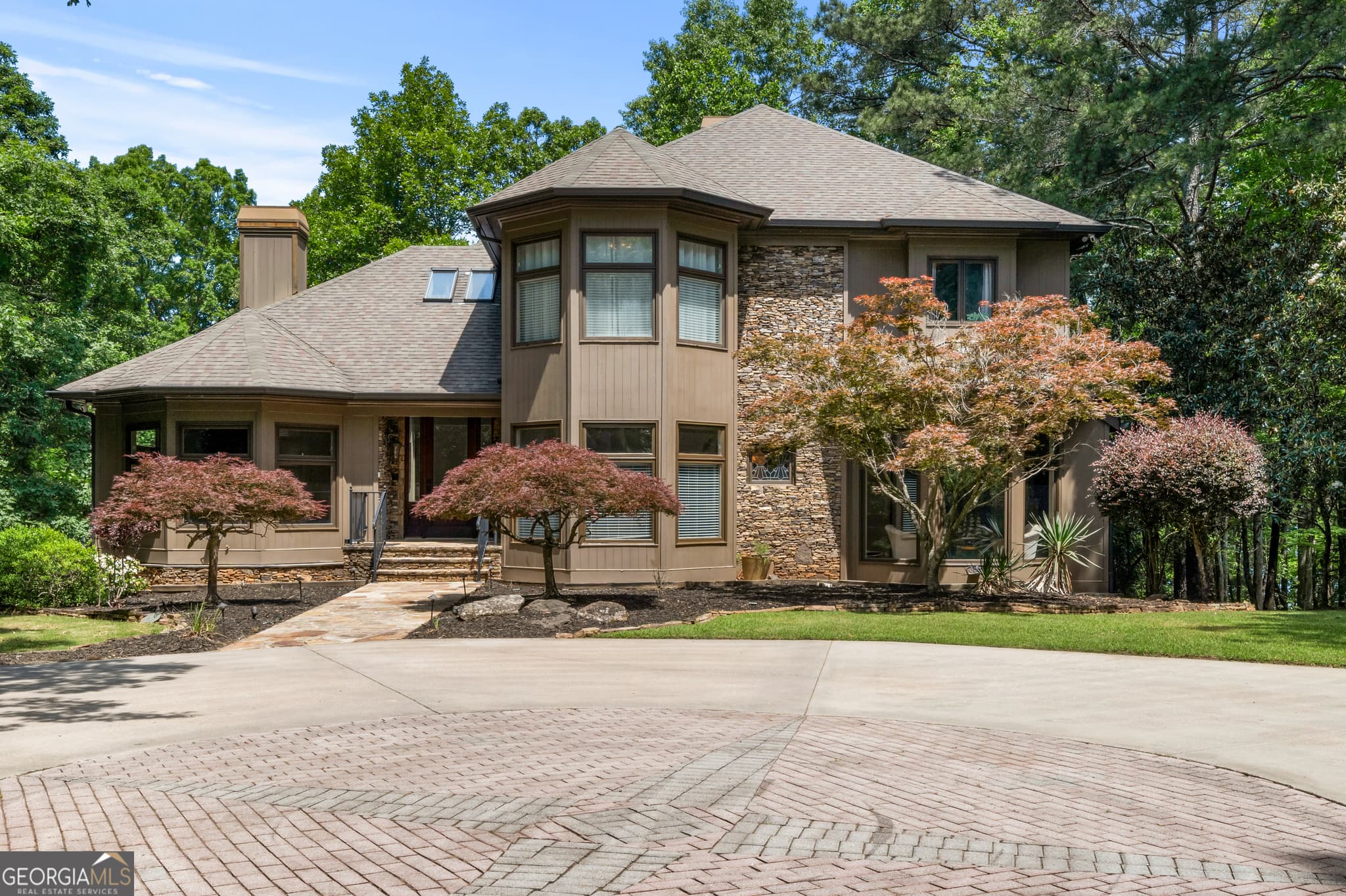5 bedroom, 4 bathroom, 5,406 sq ft single family residence sold at 6525 Cox Drive, Flowery Branch, GA 30542