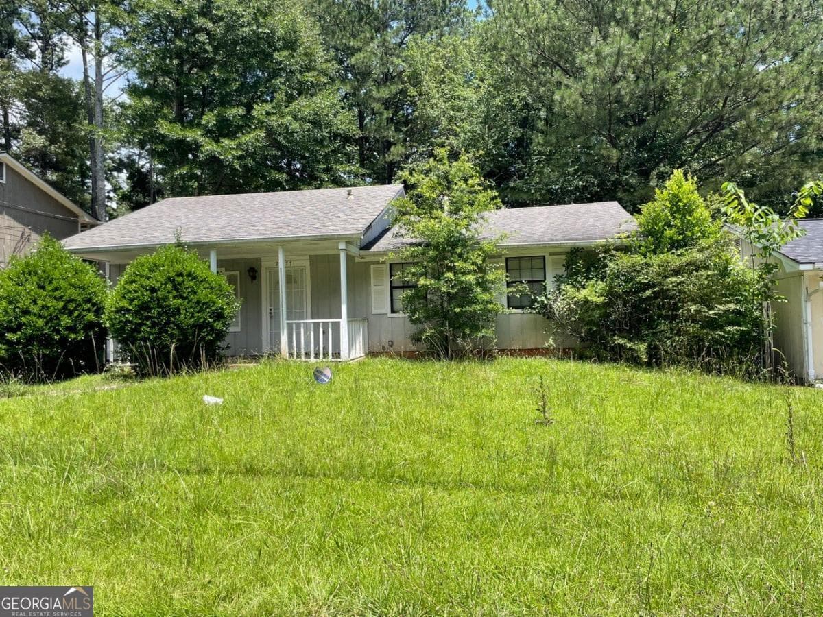 3 bedroom, 2 bathroom, 1,176 sq ft single family residence for sale at 2177 Jonathan Avenue, Lithonia, GA 30058