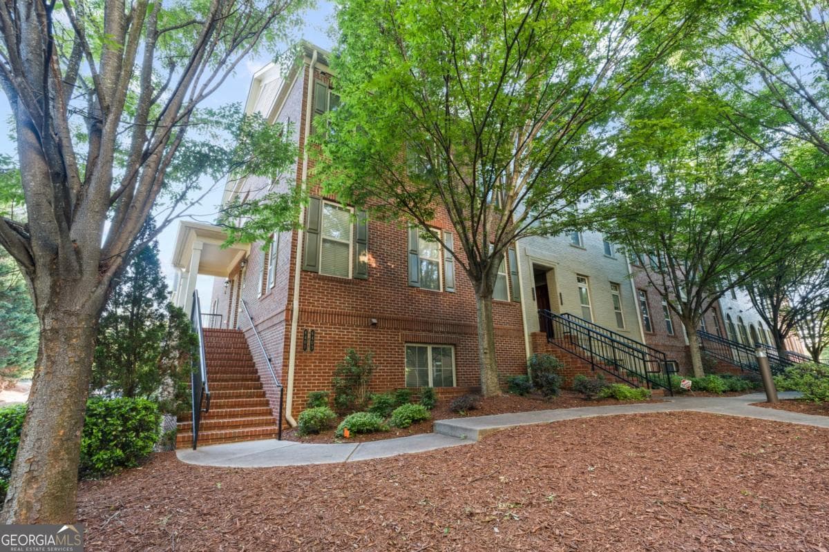 2 bedroom, 2.5 bathroom, 1,670 sq ft townhouse sold at 6403 Paulson Place, Atlanta, GA 30328