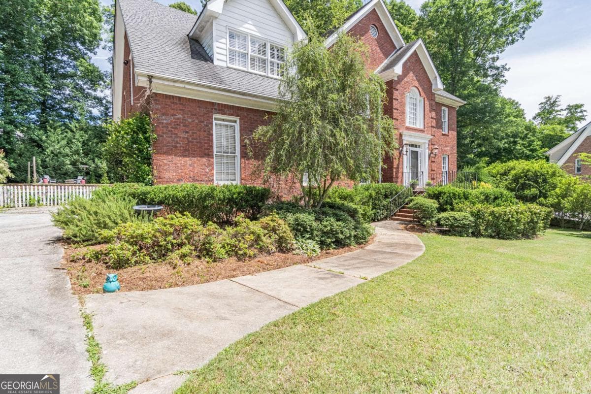 6 bedroom, 4 bathroom single family residence sold at 2702 Thatcher Court, Lawrenceville, GA 30044
